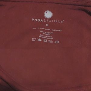 Cherry/maroon colored athletic leggings